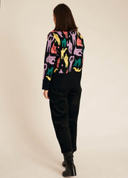 YETIS CROSSED SWEATER